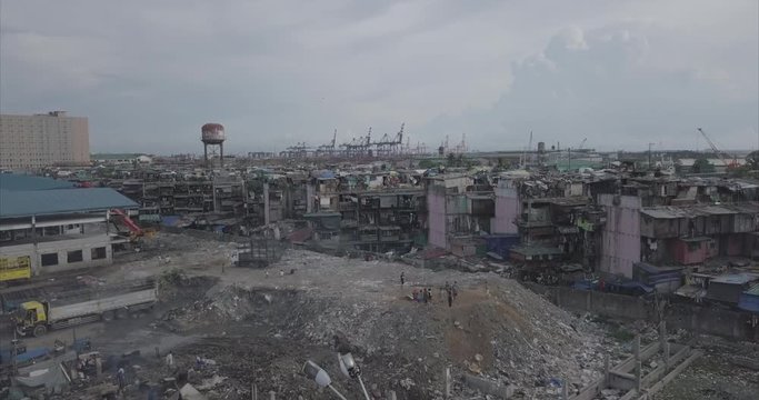 Ungraded, Straight aerial flight over garbage dump towards poor housing area. Drone, 4K. 