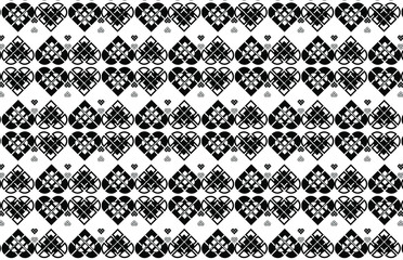 Overlapping black and white hearts backdrop made from square block shapes in a repeating pattern