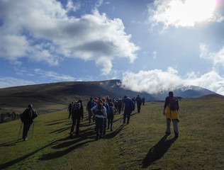 Hikers with shadows hiking in Lake Dostrict