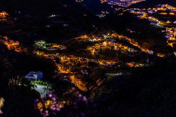 Obraz na płótnie Canvas night photo of a mountain canary village with lights