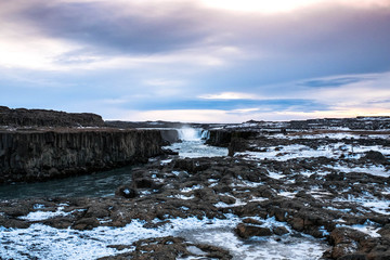 Selfoss waterfall in Northeast Iceland runs through a rock gorge
