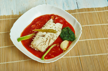 Herb  garlic baked cod with romesco sauce