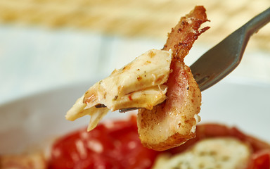 Cod with chopped tomatoes,  crispy pancetta,