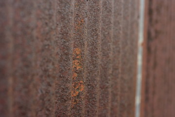 The wall is zinc rust brown, used as a background image.
