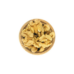 Walnuts in wood bowl close up isolated on white background.
