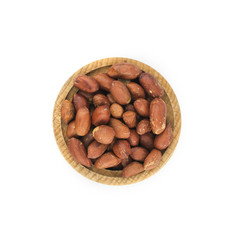 Peanuts in wood bowl close up isolated on white background..