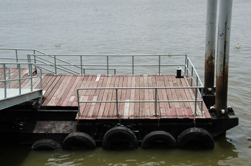 Old docks by the river during the day time