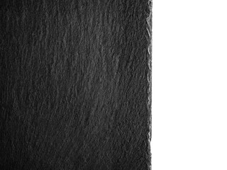 Black slate plate fragment. Black stone slate board. Top view of an empty slate surface isolated on white.
