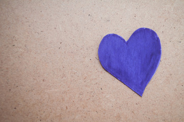 Fototapeta premium purple heart. Expression of understanding and compassionate love. Love and caring. The concept of parents and children. Military medal for wounded soldiers.