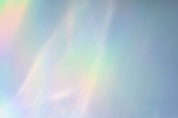 Blurred rainbow light refraction texture overlay effect for photo and mockups. Organic drop...