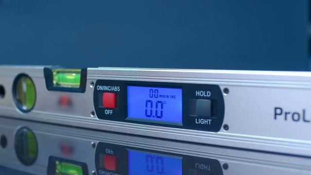 The modern device, which is very necessary in construction and repair - digital magnetic goniometer and level - measuring the angle of an inclined surface and horizontal of surface