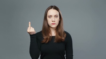 Video of young girl in black shirt showing middle finger