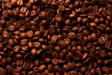 Organic roasted coffee bean background. Natural ingredient, agriculture, coffee shop, texture