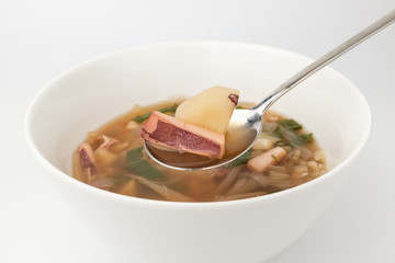Squid soup on white background
