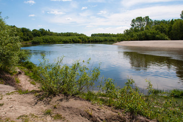 Very beautiful natural landscape in Ukraine. Sky, water and forest in summer or spring. Desna river in the city of Chernihiv.