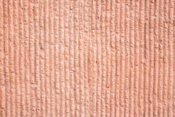red stone wall vertical laying