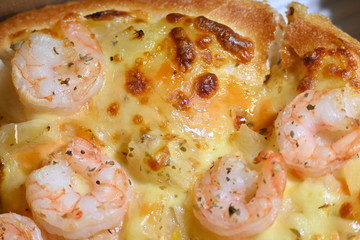 italian pizza cheese with pineapple and shrimp topping sea food