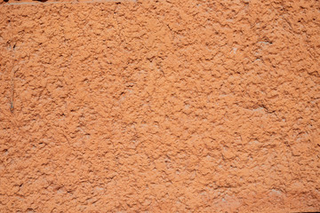 orange perforated cement wall loose