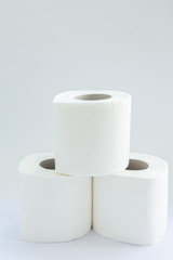 toilet paper rolls on a white background