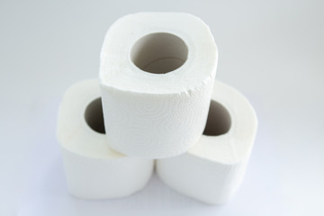 toilet paper rolls on a white background