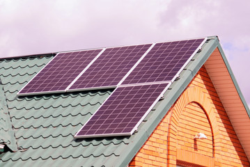 Fototapeta premium Solar panels on the roof of house.