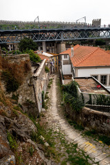 Fototapeta na wymiar Path crossing the old Porto and leading to the Dom-Luis bridge.