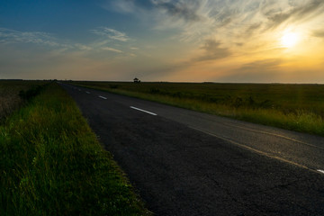 Fototapeta premium road in the sunset