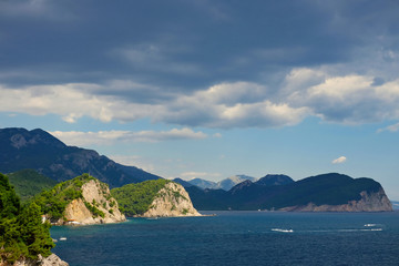 Mountains on the Adriatic Sea under large clouds