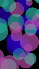Multicolored translucent circles on a dark background. 3D illustration