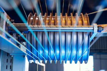 Inside a modern plant producing power electric cables and optical fibers. .Cable manufacturing...