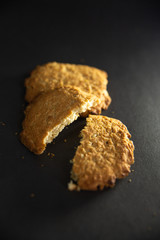 oatmeal cookies on a black background