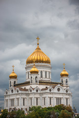 Fototapeta na wymiar Catherdal of Christ the Saviour Moscow with a moody cloudy sky