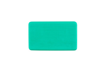 a bar of green blue color soap isolated on a white background close up top view