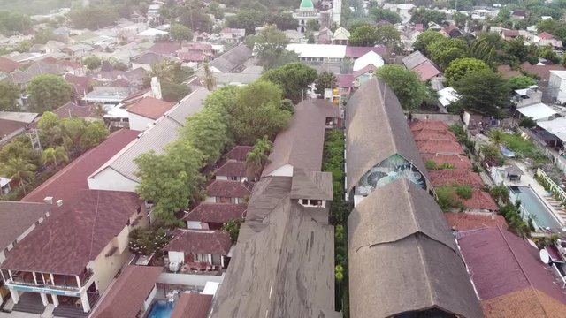 Bali Seminyak orange tile roofs and blue sky