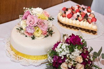 Obraz na płótnie Canvas wedding and birthday cake with beautiful and original fine and delicate decoration