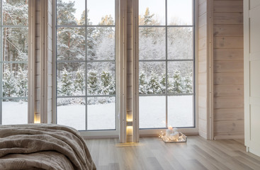Fototapeta premium Bright photo studio interior with big window, high ceiling, white wooden floor