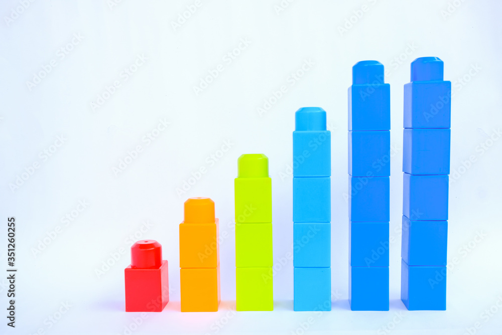 Wall mural business graph and chart content. colorful plastic building blocks arrangement in a graph-like layou