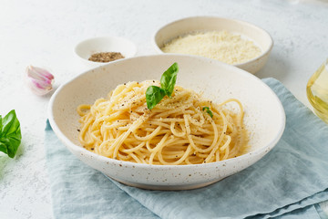 Cacio e pepe pasta. Spaghetti with parmesan cheese and pepper.