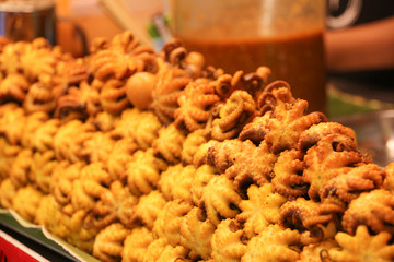 Fried mini octopuses ready to eat at a Bangkok street stall