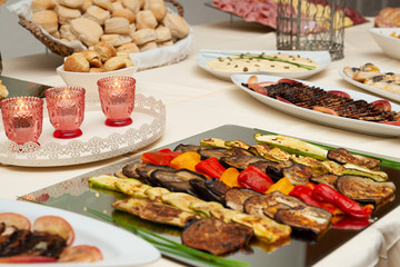 Grilled vegetables on cold cuts buffet table for events