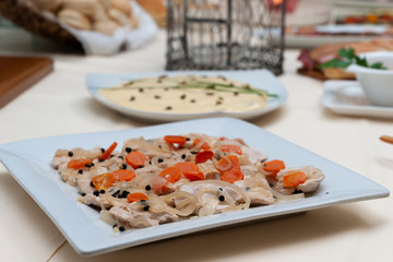 
table of fiembres presented in tables and sources in a banquet with variety of sausages and...