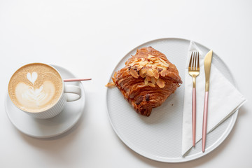 cup of coffee with croissant. French breakfast. breakfast on a white background. serving breakfast....