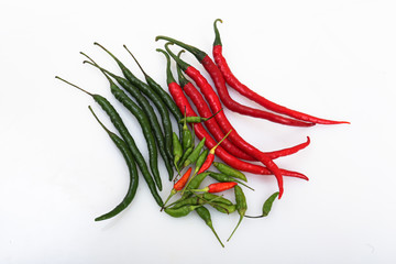 green chili, red chili, and cayenne pepper, white background isolated