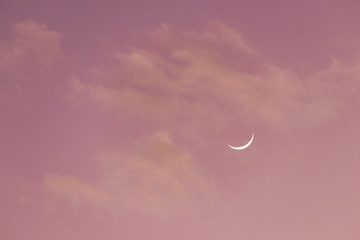 Obraz na płótnie Canvas Crescent moon on sweet sky. Look like a smile on a good day.