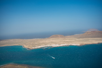 Aerial view on the coastline of Lanzarote island on a sunny day 