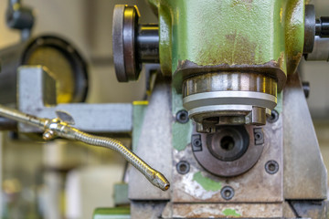 Machine workshop with drilling machine in morning