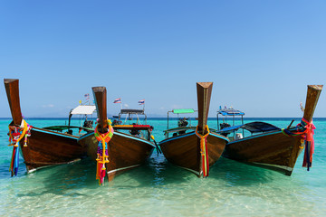 Fototapeta na wymiar Asian boats on turquoise water