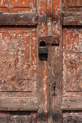 Old wooden door with lock