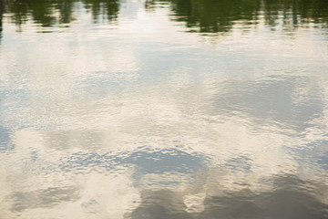 Water in the river. Water with light waves. Beautiful background.