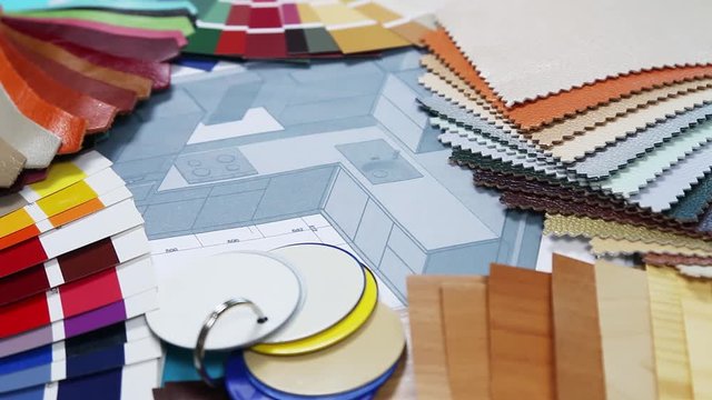 select a color from the color sample pallets in the designer's workspace. choice of materials, textures and colors for room renovation